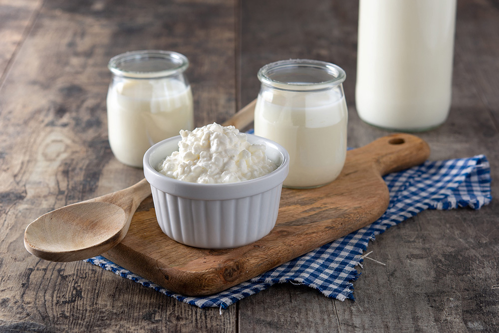 Milk kefir grains on wooden table