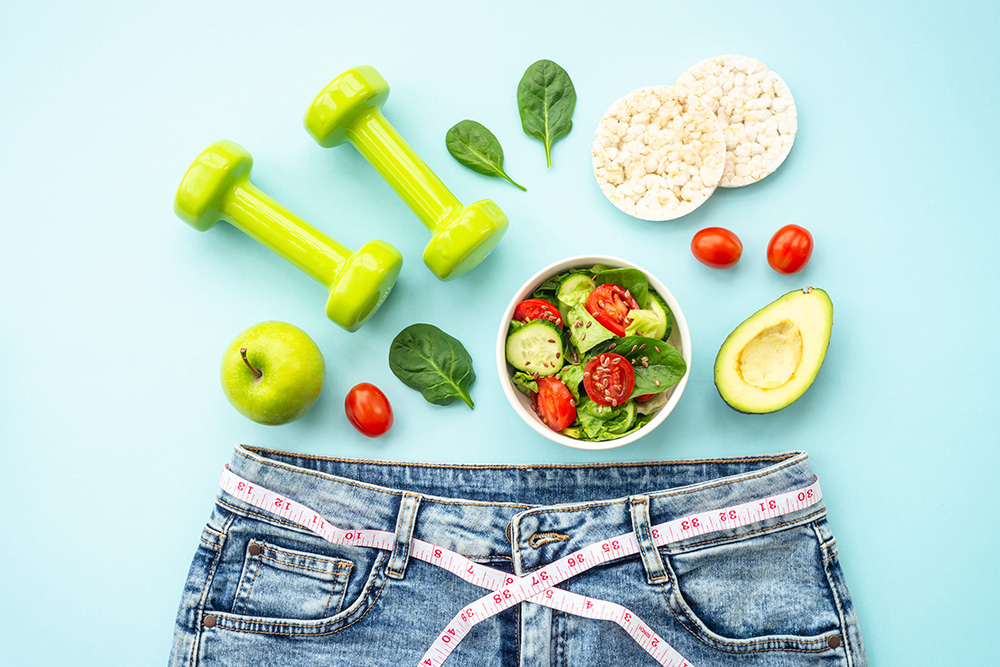 Diet food, healthy lifestyle and fitness background on blue.