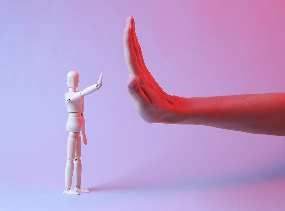 High-five female hand and puppet in red blue neon light